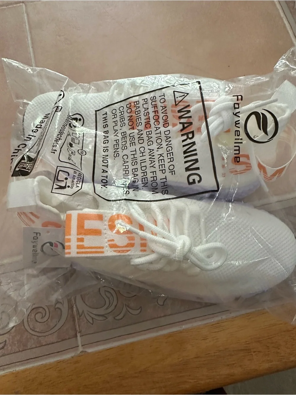 Faywellme White Knit Sneakers with Orange Text Accents